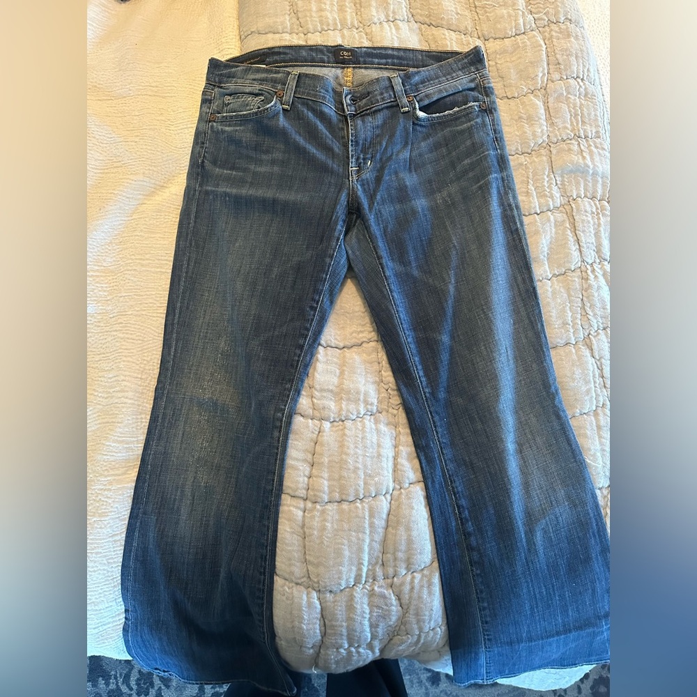 Gently used pair of citizens dark bootcut jeans. Size 31.